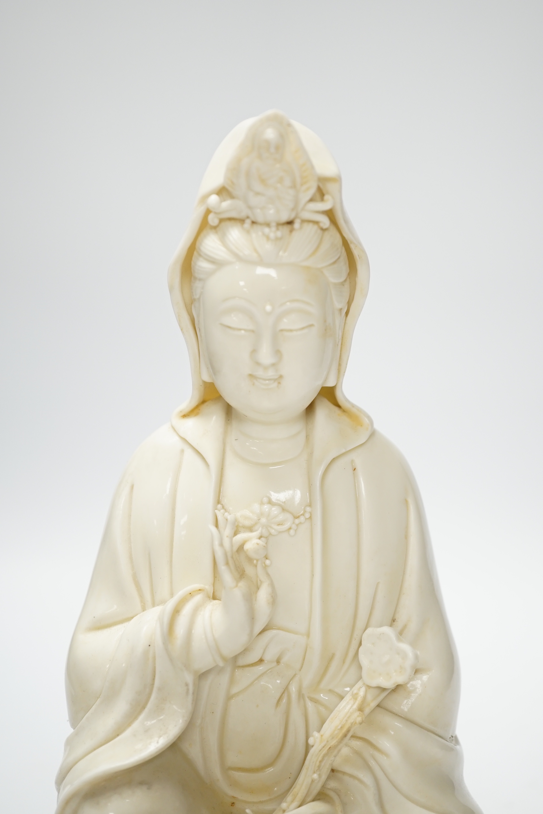 A Chinese blanc de chine figure of Guanyin, 26cm